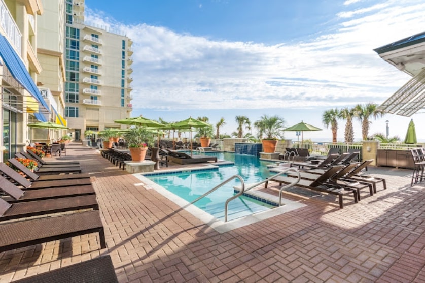 A beautiful view of the pool that is part of the Ocean Beach Club Resort