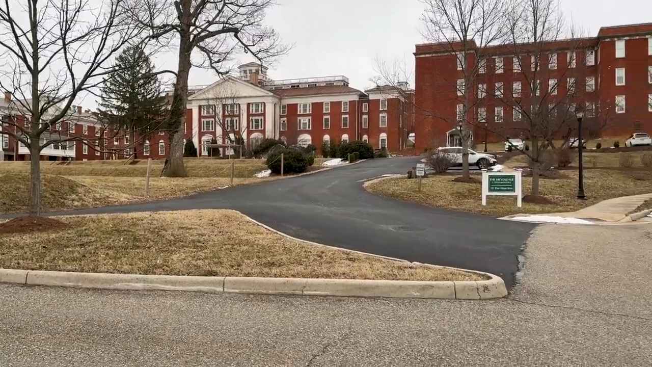 A large historic red-brick building complex with white columns and dormer windows, formerly Western State Hospital in Staunton, Virginia