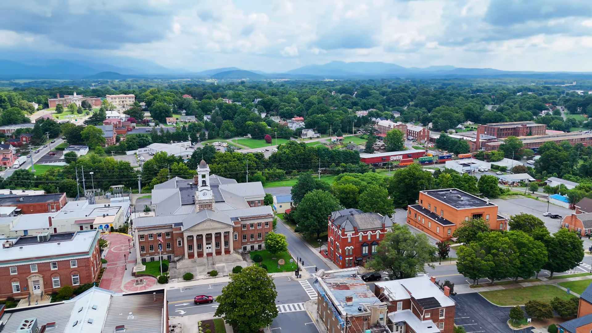 Aerial view of Bedford, Virginia, showing the courthouse, historic buildings, and surrounding green landscape